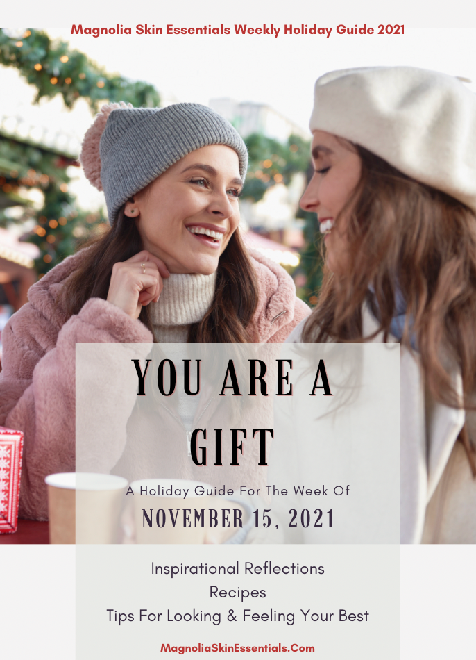 Weekly holiday guide cover reading 'You Are a Gift' with two women in winter hats