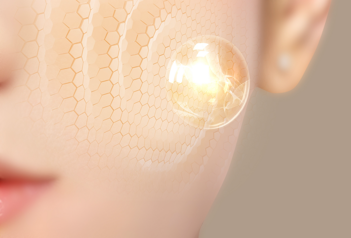 Close-up of skin with a glowing light, illustrating skin cells