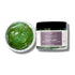 Magnolia Jojoba Brightening Face Scrub jar showing green jojoba bead texture