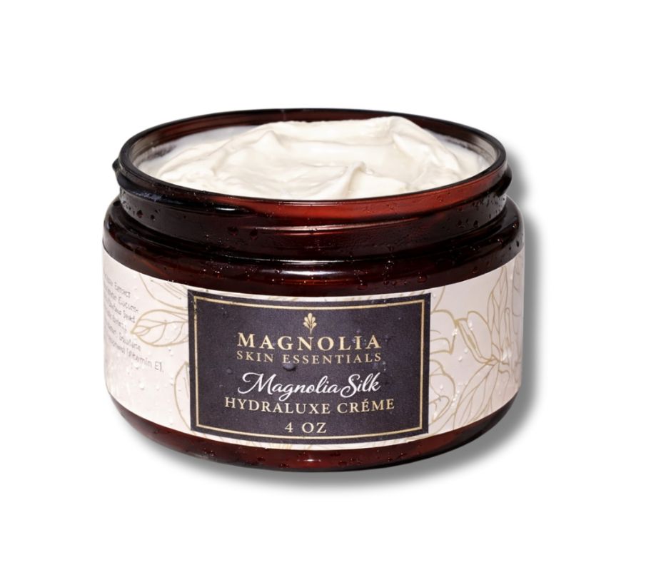 Open jar of Magnolia Silk Hydraluxe Crème