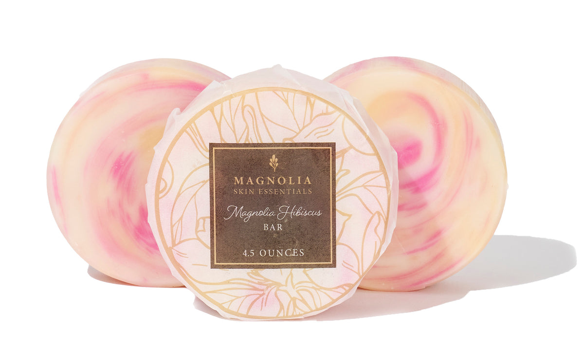 Magnolia Hibiscus-Infused Bars beside their floral label